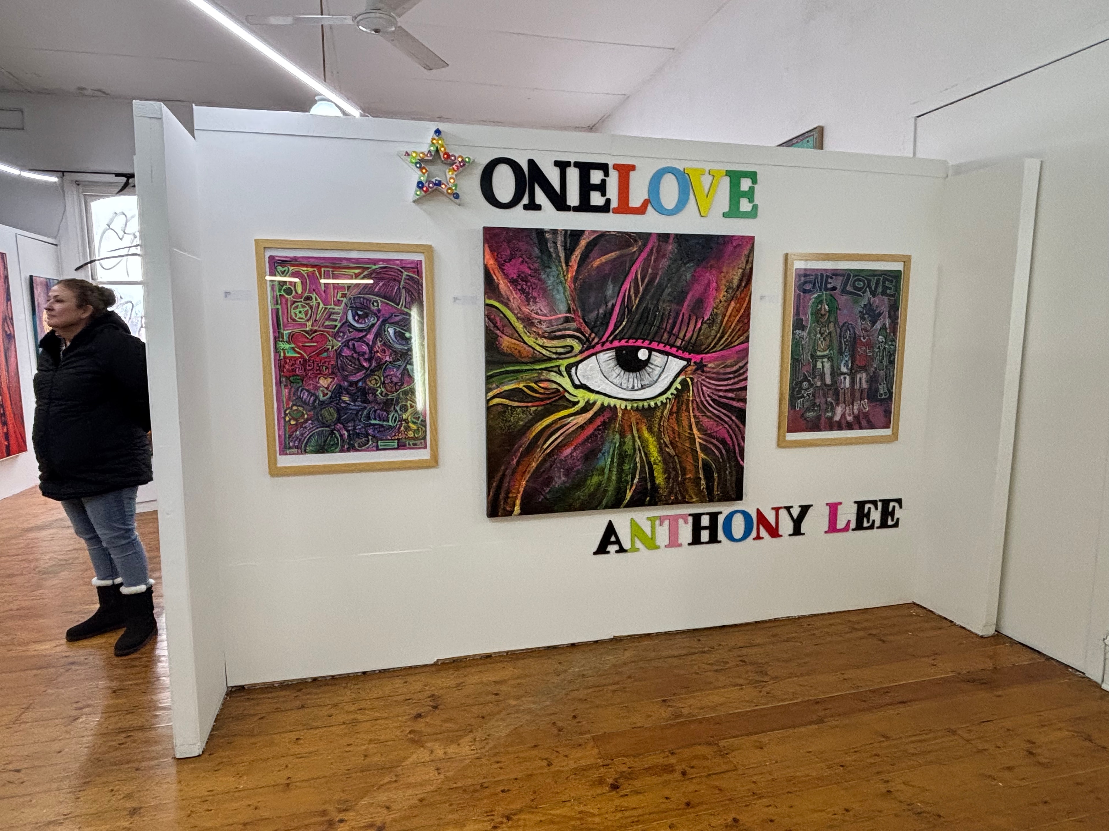 Visitors at the One Love exhibition opening by Anthony Lee